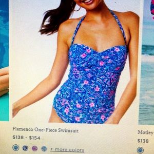 Lilly Pulitzer Swimsuit in a size 10. Coverup included is a small.